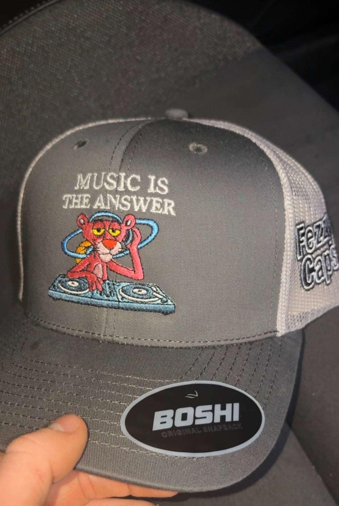 Pink panther music is the answer- grey/white